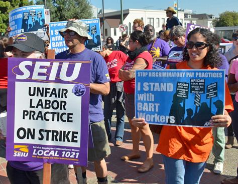 Supporters rally with BART workers on the first day of the strike