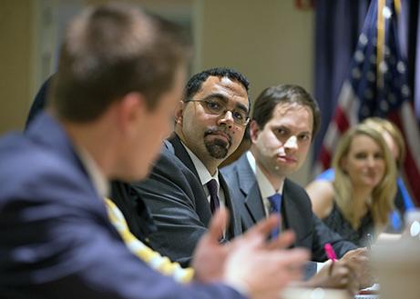 Teachers meet with Education Secretary John King (center, with glasses) for a roundtable discussion