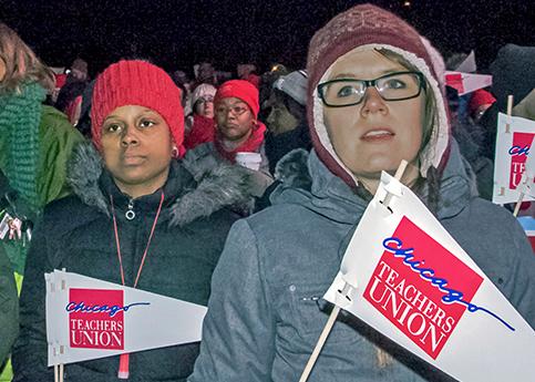 Members of the Chicago Teachers Union rally for a fair contract