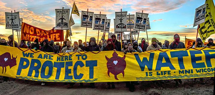 Water protectors at Standing Rock march to stop the Dakota Access Pipeline