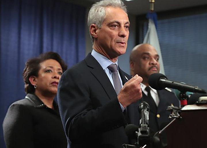 Chicago Mayor Rahm Emanuel speaks at a DOJ press conference alongside U.S. Attorney General Loretta Lynch (left) and Chicago police Superintendent Eddie Johnson (right)