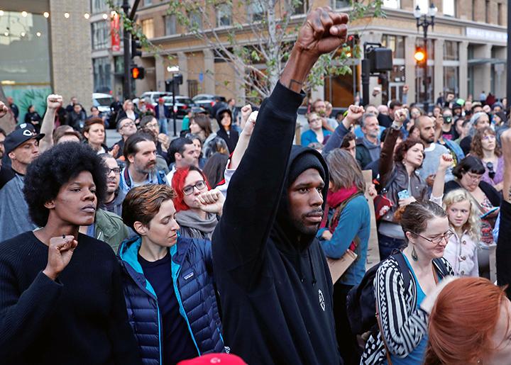 Standing in solidarity with Charlottesville at a vigil in Oakland, California