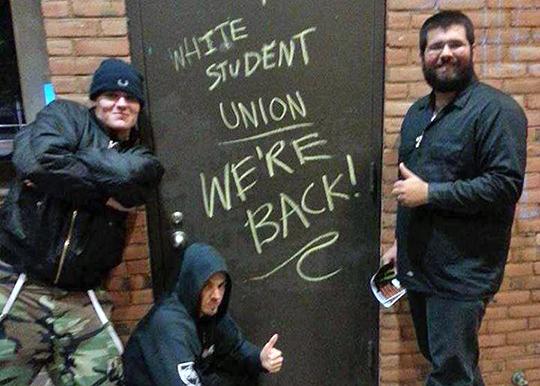 White supremacists, led by Matthew Heimbach (right) vandalize the Towson University campus