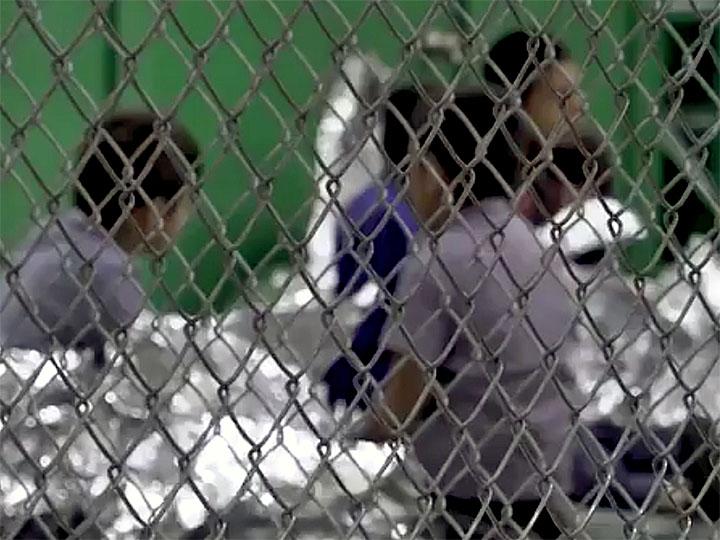 Migrant children held in cages at a detention center in McAllen, Texas