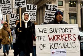 Supporters of workers at Republic Windows & Doors picket the Bank of America building in Chicago