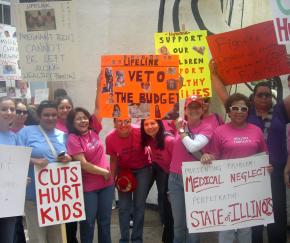 Protesting budget cuts outside the State of Illinois Building in Chicago