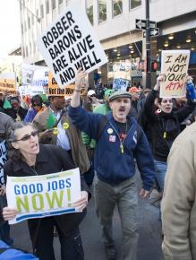 Protesters at the May 12 mass march on Wall Street calling for an end to cuts and attacks on working people