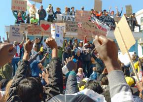 Refugees and solidarity activists rally for migrant justice on the Greek island of Lesbos