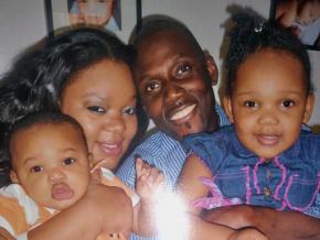 Saja Tunkara (center right) with ShaCorrie Wimbley Tunkara and their family