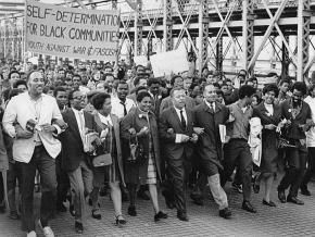 Supporters of community control for Ocean Hill-Brownsville march across the Brooklyn Bridge