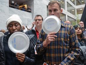 Federal workers protest the government shutdown inside the Senate Office Building